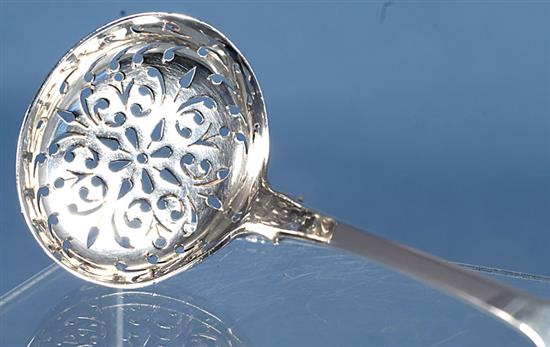 An early Victorian silver fiddle pattern sifter spoon, by John Harris IV & 2 others, 111 grams.